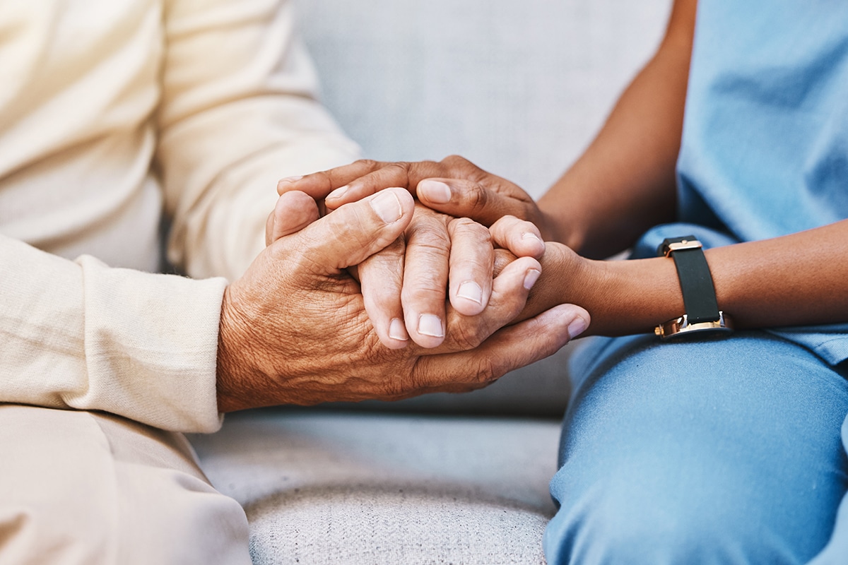 Nurse hands and senior patient in empathy